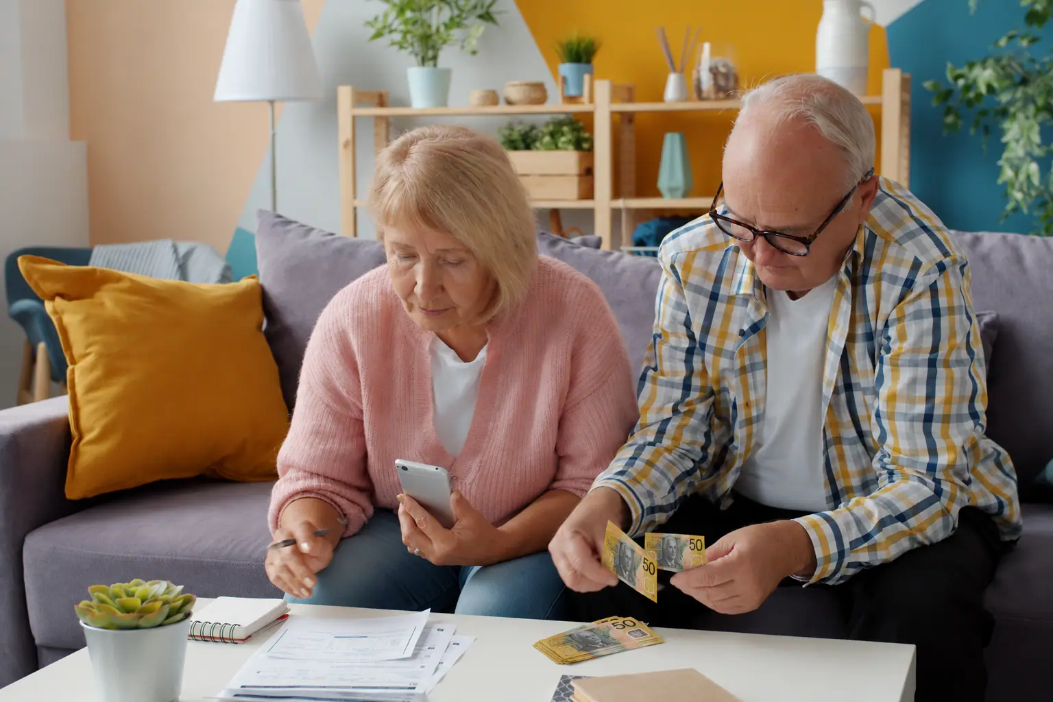 Senior couple managing funding