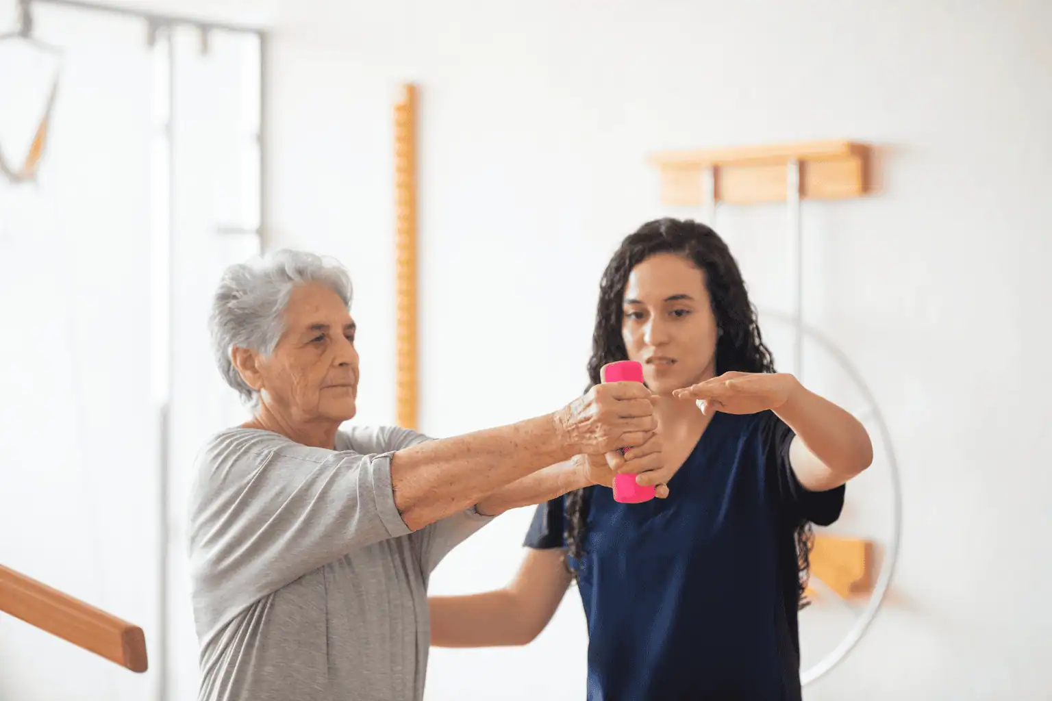 Support worker helping senior lady