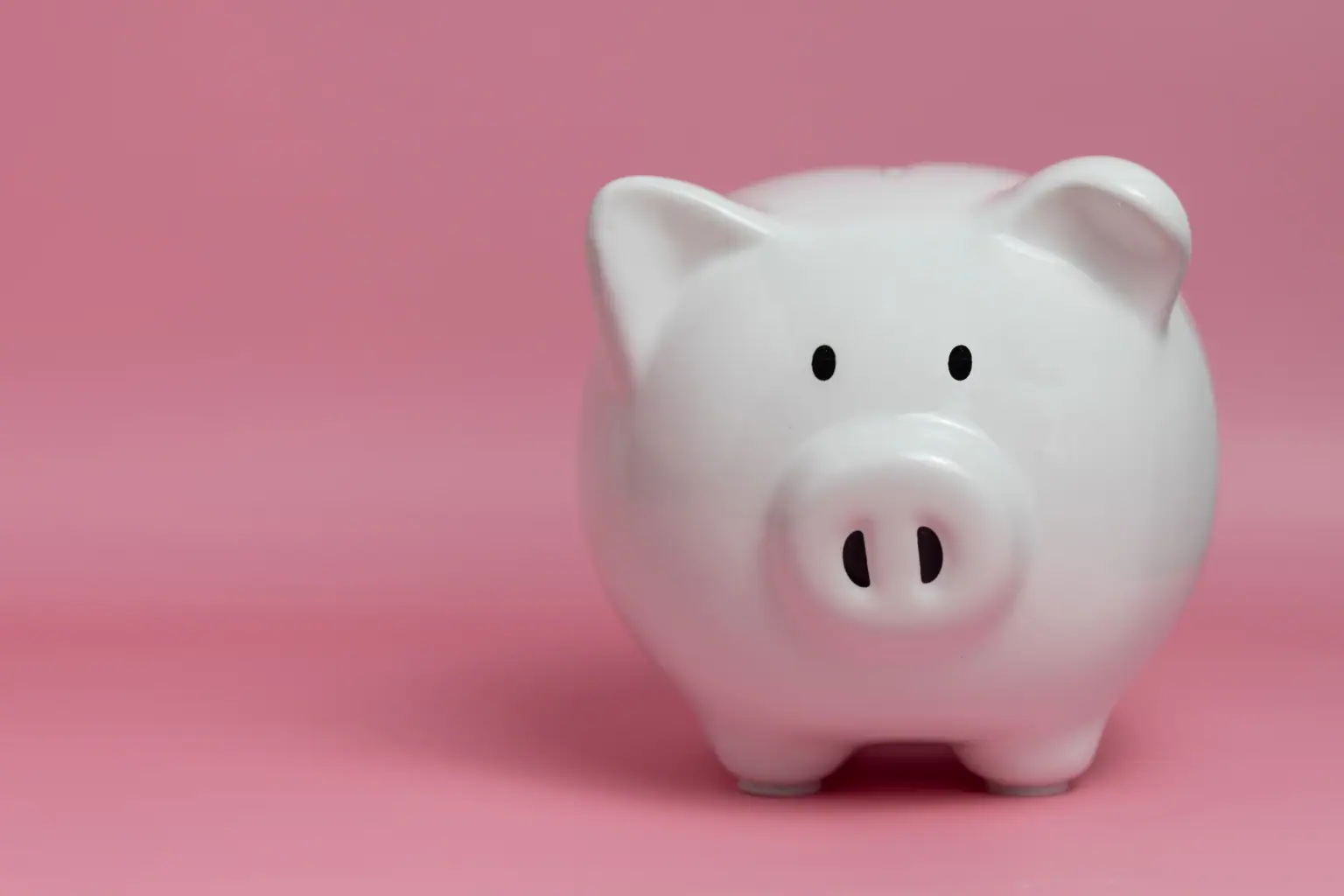 Piggy bank pink background